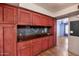 Cozy kitchen featuring custom wood cabinets and a chalkboard wall for creative expression at 2545 N 14Th St, Phoenix, AZ 85006