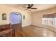 An open living room with hardwood floors leads to the dining room, complemented by large windows at 2545 N 14Th St, Phoenix, AZ 85006