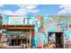 Exterior with colorful mural art and greenery near the entrance of a shop at 2545 N 14Th St, Phoenix, AZ 85006
