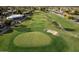 Manicured golf course with green grass, sand traps, and mature trees, perfect for outdoor recreation at 25609 N Forest Rd # 13, Rio Verde, AZ 85263