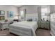 Bright main bedroom with natural light, stylish furniture, and neutral decor at 2597 E Hickory St, Gilbert, AZ 85298