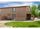 Grassy backyard with covered patio and balcony at 26956 N 83Rd Gln, Peoria, AZ 85383