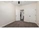 Bedroom showing the closet, and entry to the bathroom at 26956 N 83Rd Gln, Peoria, AZ 85383