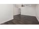 Neutral bonus room with a ceiling fan, recessed lights, and wood floors at 26956 N 83Rd Gln, Peoria, AZ 85383