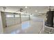 Spacious three-car garage with ample room for vehicles and additional storage space at 28093 N Pasture Canyon Dr, San Tan Valley, AZ 85143
