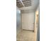 Hallway with tile floors and a closet with sliding doors, leading to the bathroom at 28093 N Pasture Canyon Dr, San Tan Valley, AZ 85143