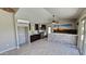 Gourmet kitchen featuring stainless steel appliances, dark cabinets, and a breakfast bar for casual dining at 28093 N Pasture Canyon Dr, San Tan Valley, AZ 85143
