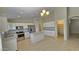 Bright kitchen with white cabinets, stainless steel appliances, and a center island at 28093 N Pasture Canyon Dr, San Tan Valley, AZ 85143