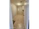 Bright laundry room with tile flooring and overhead cabinet for convenient storage at 28093 N Pasture Canyon Dr, San Tan Valley, AZ 85143