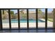 Beautiful outdoor pool area with lush landscaping, ideal for summer relaxation and outdoor entertainment at 28093 N Pasture Canyon Dr, San Tan Valley, AZ 85143