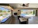 Entertainers dream pool area with outdoor kitchen, bar, and seating for relaxing fun at 28093 N Pasture Canyon Dr, San Tan Valley, AZ 85143