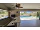 Entertainers dream pool area with outdoor kitchen, bar, and seating for relaxing fun at 28093 N Pasture Canyon Dr, San Tan Valley, AZ 85143