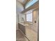 Modern walk-in shower with a glass enclosure, rainfall showerhead, and built-in bench for a luxurious spa experience at 28093 N Pasture Canyon Dr, San Tan Valley, AZ 85143