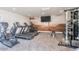 Community gym offers treadmills and weight machines with inspiring mural at 305 S Val Vista Dr # 243, Mesa, AZ 85204