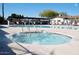 Relaxing community hot tub with sparkling water and easy access to the pool at 305 S Val Vista Dr # 243, Mesa, AZ 85204
