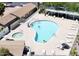 Aerial view of a sparkling community pool with lounge chairs at 305 S Val Vista Dr # 243, Mesa, AZ 85204