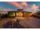 Charming single-Gathering home displays an appealing facade with well-maintained landscaping and a paver driveway at 31108 N 122Nd Ln, Peoria, AZ 85383