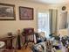 Cozy living area with lots of art supplies and a view of the door to the patio at 3231 N 81St Pl, Scottsdale, AZ 85251