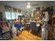 Home office space with an abundance of storage shelves and memorabilia at 3231 N 81St Pl, Scottsdale, AZ 85251