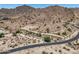 Desert homesite showing access roads, desert landscape, and scenic mountain backdrop at 3284 W Highlands Dr, Buckeye, AZ 85396