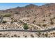 Desert homesite displaying access roads and views of surrounding mountain at 3284 W Highlands Dr, Buckeye, AZ 85396