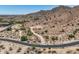 Desert home site featuring access roads and mountain backdrop at 3284 W Highlands Dr, Buckeye, AZ 85396