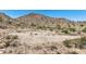 Desert homesite with existing cinder block walls and desert landscaping at 3284 W Highlands Dr, Buckeye, AZ 85396