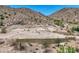 Desert homesite with existing cinder block walls and desert landscaping at 3284 W Highlands Dr, Buckeye, AZ 85396