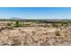Scenic homesite with views of mountains and high-end residences in the distance at 3284 W Highlands Dr, Buckeye, AZ 85396