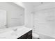 Clean bathroom featuring a vanity with a sink, a mirror and a shower-tub combo at 33731 N Bowles Dr, San Tan Valley, AZ 85144