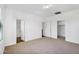 Spacious bedroom with carpet floors, three doors, and lots of natural light at 33731 N Bowles Dr, San Tan Valley, AZ 85144