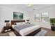 Bright bedroom with large windows, a king bed and stylish decor at 33731 N Bowles Dr, San Tan Valley, AZ 85144