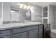 Bright bathroom features granite countertops and modern fixtures, including a washing machine at 3416 N 44Th St # 70, Phoenix, AZ 85018