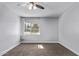 Cozy bedroom featuring carpeted floors and ample natural light through window at 3416 N 44Th St # 70, Phoenix, AZ 85018