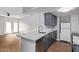 Modern kitchen boasts granite counters and efficient layout, open to living area at 3416 N 44Th St # 70, Phoenix, AZ 85018