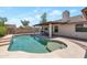 Inviting backyard pool with a covered patio and exterior view at 350 E Huber St, Mesa, AZ 85201
