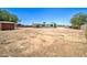 Spacious backyard featuring a shed, patio, and plenty of room for activities on a desert lot at 35019 N Central Ave, Phoenix, AZ 85086
