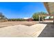 View of the expansive backyard and patio with an outdoor storage shed at 35019 N Central Ave, Phoenix, AZ 85086