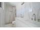 Bathroom featuring dual sinks, stand up shower and tile flooring at 35019 N Central Ave, Phoenix, AZ 85086