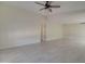 Bright bedroom featuring light-colored walls and tile floors at 35019 N Central Ave, Phoenix, AZ 85086