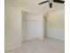 Bedroom featuring a closet with built-ins, and a bright window at 35019 N Central Ave, Phoenix, AZ 85086