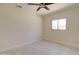 Bedroom featuring a ceiling fan and a bright window at 35019 N Central Ave, Phoenix, AZ 85086