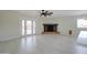 Open living area features tile flooring, fireplace, and double glass doors at 35019 N Central Ave, Phoenix, AZ 85086