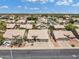 Aerial view of a well-maintained neighborhood with mature landscaping, tile roofs, and convenient street access at 3580 W Dublin St, Chandler, AZ 85226
