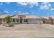 Charming single-story home with desert-style landscaping, large windows, and a spacious two-car garage at 3580 W Dublin St, Chandler, AZ 85226