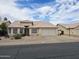 Charming single-story home with tile roof, desert landscaping, and a spacious two car garage at 3580 W Dublin St, Chandler, AZ 85226