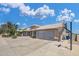 Beautiful home featuring desert landscaping, a tile roof, two-car garage, and a basketball hoop for Gathering fun at 3580 W Dublin St, Chandler, AZ 85226
