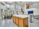 Kitchen with tile floors and natural light, conveniently situated near a breakfast nook with large windows at 3580 W Dublin St, Chandler, AZ 85226