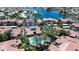 Aerial view showcasing resort-style amenities including pool, spa, and pristine lakefront property at 3830 E Lakewood E Pkwy # 2126, Phoenix, AZ 85048