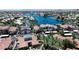 Overhead view of a lakefront condo community showing the community entrance and manicured landscaping at 3830 E Lakewood E Pkwy # 2126, Phoenix, AZ 85048